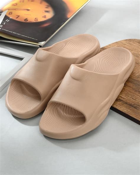 men's beige sliders.